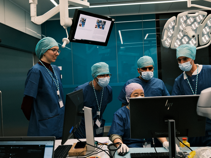 Scientific team checks the analytical analyses of an experiment on the computer.