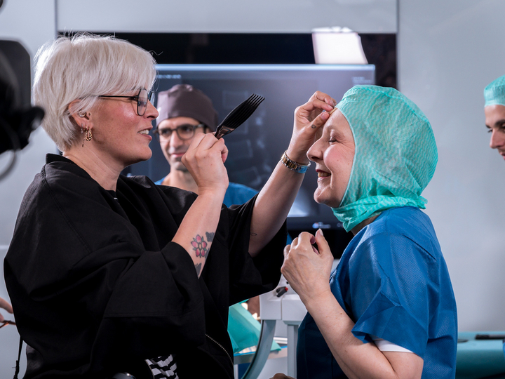 Dr. Jeanne Fürst receives make-up before shooting the next scene in OR-X.