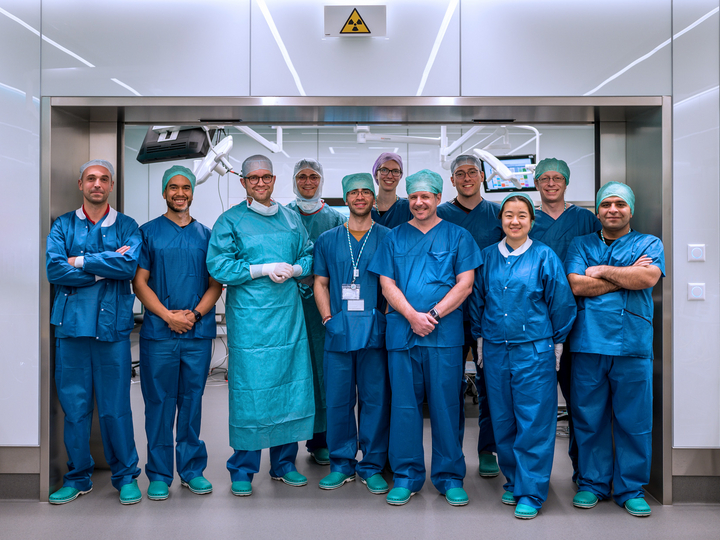 Part of the FAROS team standing in the OR-X for a group picture.