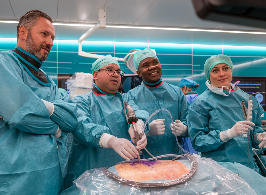 Four surgeons perform an endoscopic examination in OR-X as part of the EndoSpine Academy.